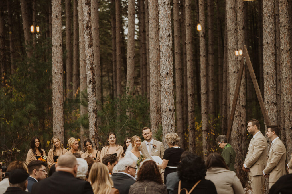 Bride and groom get married at winter wedding venue Pinewood Weddings and Events in Minnesota